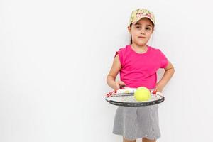 little girl with a tennis racket photo