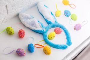 Colorful Easter eggs with hand drawn bunny ears. Funny Easter concept photo