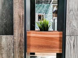 Interior design of a luxury bathroomand decorative pots with plants on the counter. photo