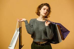 Teenage girl with shopping bags photo