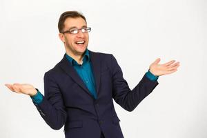 A view of a shocked young businessman isolated on white background photo