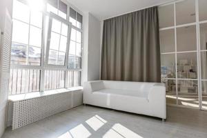 white sofa in room photo