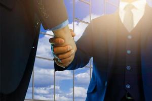 Business partnership meeting concept image businessmans handshake successful businessmen photo