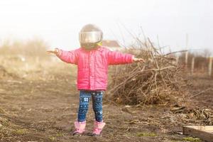 little girl in a motorcycle helmet photo