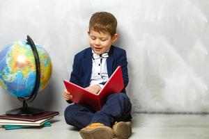 little student holding books, self-education photo