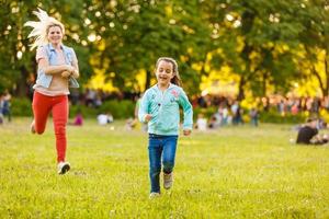 Beautiful little girls enjoying outside photo