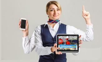Multi-tasking businesswoman stewardess photo