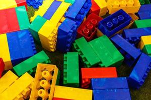 Plastic toy blocks for construction background photo