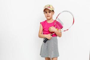 little girl with a tennis racket photo