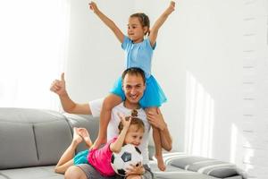 little girls with soccer ball at home photo