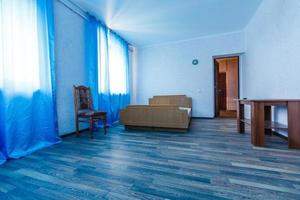 blue living room with vintage style furniture photo