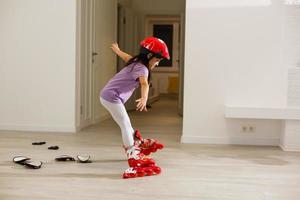 Cute girl on roller skates against photo