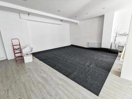 black carpet laid in the office photo