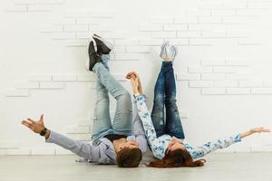 Happy young couple moving in their new apartment photo