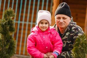 Granddaughter with cute little granddaughter enjoying photo