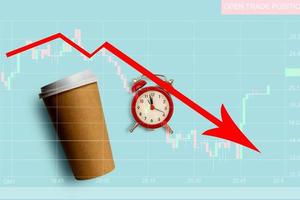 Simply flat lay design brown paper coffee cup and alarm clock isolated on blue pastel colorful background photo