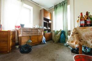 Devastated kitchen in a demolition house photo