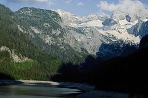 Snow covered mountains at Vorderer Gosausee, Gosau, Upper Austria. photo