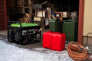 Gasoline portable generator with canisters. Mobile backup standby generator. photo