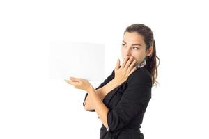 woman in uniform with white placard in hands photo