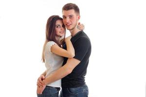 beautiful young couple standing together and hug each other photo