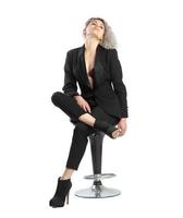 business girl posing on chair photo