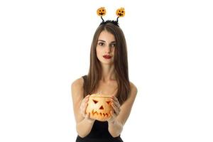 beautiful girl in halloween style clothes photo