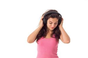 girl in headphones in studio photo