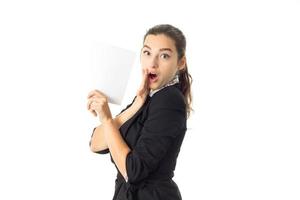 woman in uniform with white placard in hands photo