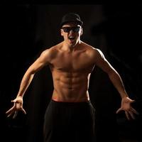 Muscular adult caucasian male screaming in studio photo