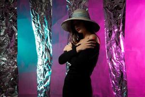 sensual photo of young beautiful girl in hat