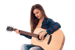 cute lady with guitar in hands photo