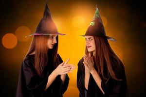 charming young girls in halloween style photo