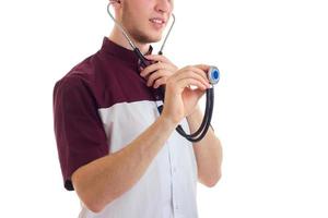 a young Laboratory Assistant holding a stethoscope and a close-up of a smiling photo