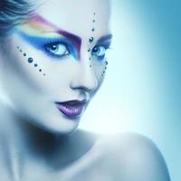 Portrait of beautiful adult woman with coloorful makeup photo