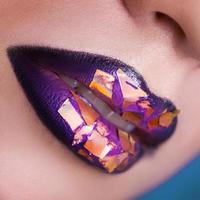 Square photo of woman lips with creative make up. macro