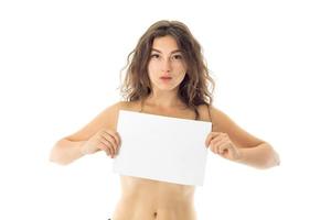 nude brunette girl with placard photo