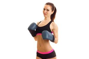 girl in black top poses on cam in boxing gloves photo