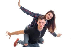 loving couple having fun and the guy wears a girl on hands photo