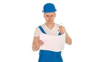 trabajador de la construcción masculino con uniforme azul foto