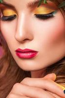 Close up portrait of woman with professional make up photo