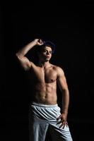 muscle body sportsman in studio photo