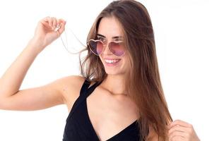 cheerful young girl in sunglasses photo