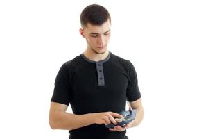 young cute guy holding a shaving typewriter photo