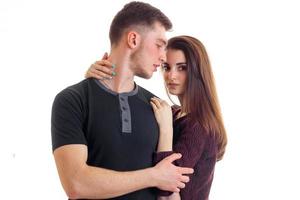 sensual beautiful couple stand in the Studio and posing for the camera photo