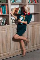 Beautiful girl in the library photo