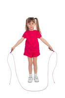 Little girl with a skipping rope photo