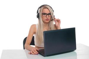 The girl in headphones with laptop photo