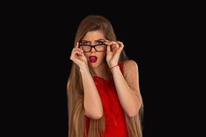Woman in glasses is posing photo