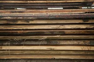 texture of sliced neatly stacked boards photo